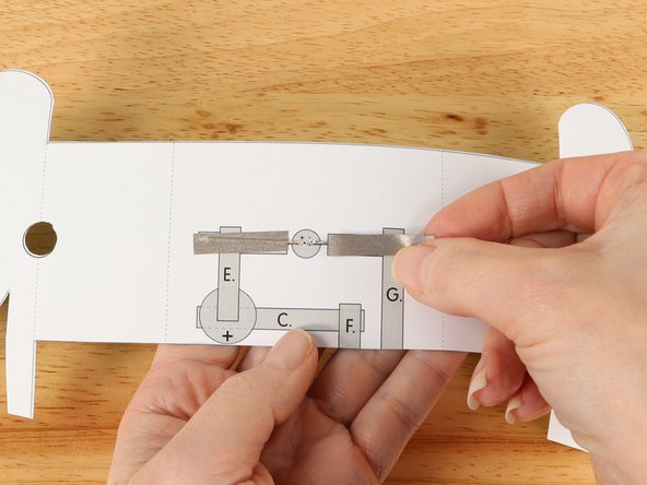 Add Maker Tape to tape path B.  over the top of the LED leg.