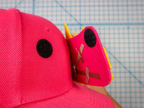 Carefully peel the hook and loop apart and squeeze each dot separately to set the adhesive.