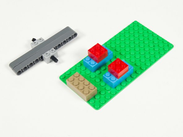 Add a 2 x 4 brick to the baseplate.