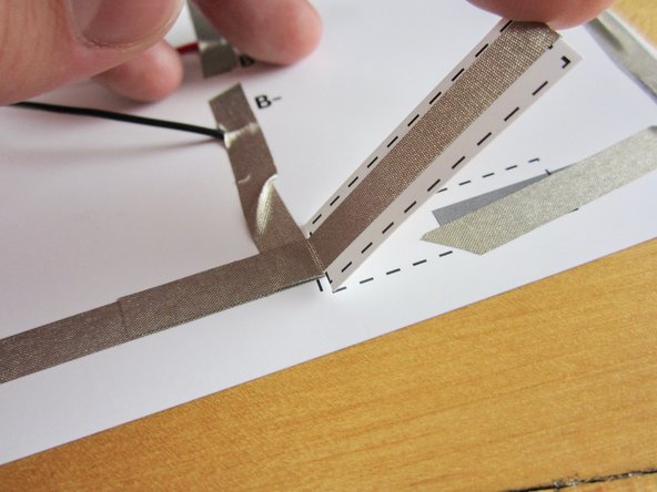 Start by placing tape in the middle of one side of your switch.