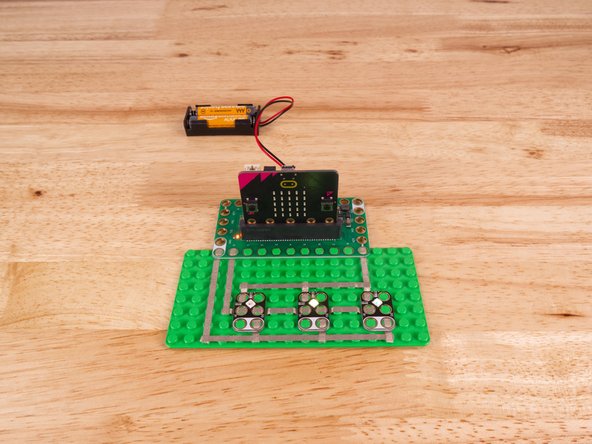 The NeoPixels need to be chained together. You'll notice the labels DI and DO on each one. These stand for Digital Input and Digital Output.