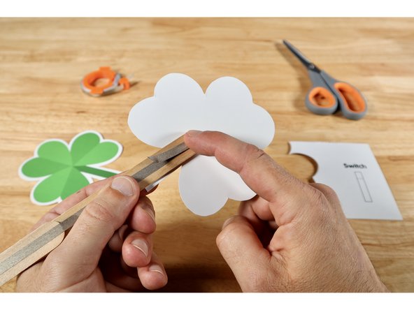 Stick that piece of Maker Tape down atop both the LED leg and the path below.