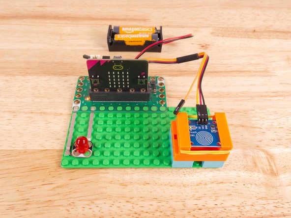 Start by plugging the connector with the three wires in it (Black, Red, Yellow) into the Pin 13 row of the Bit Board. (Make sure the Black wire is in - and the Yellow wire labeled S1 is closest to the number 13 on the Bit Board.) The Orange wire (labeled S2) does not get plugged in and can hang loose.