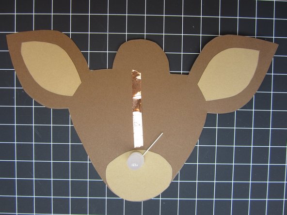 Run a piece of tape along the top of your project.