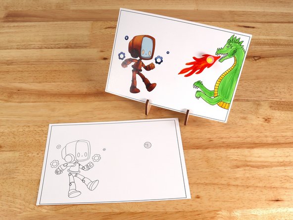 Poke holes through the front of the card for the LED legs, then push the legs through the front.