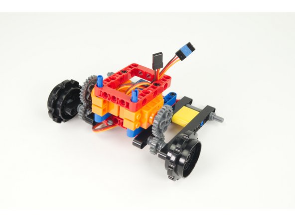 We can now slide the two front sprockets  onto the two front axles.