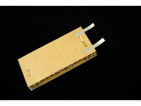 Add short strips that attach to the top of the pieces that are wrapped to the bottom, and then wrap those pieces to the top.