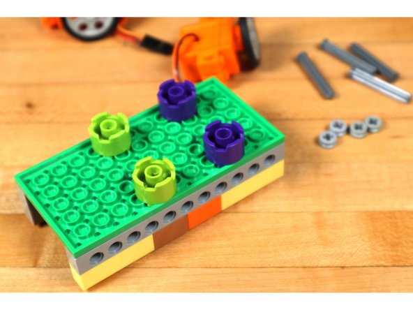 Each servo motor will need to get mounted to the bottom of your robot base.