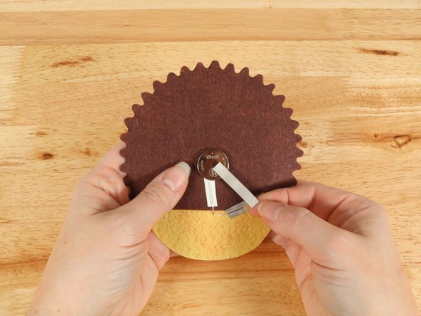 Add Maker Tape to connect the top (Positive) side of the battery to the Positive LED leg path.