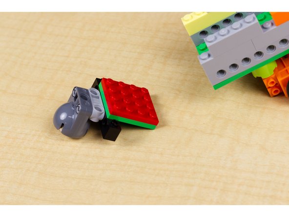 Attach caster wheel to back of robot adding any needed bricks. (We used two thin LEGO plates.)