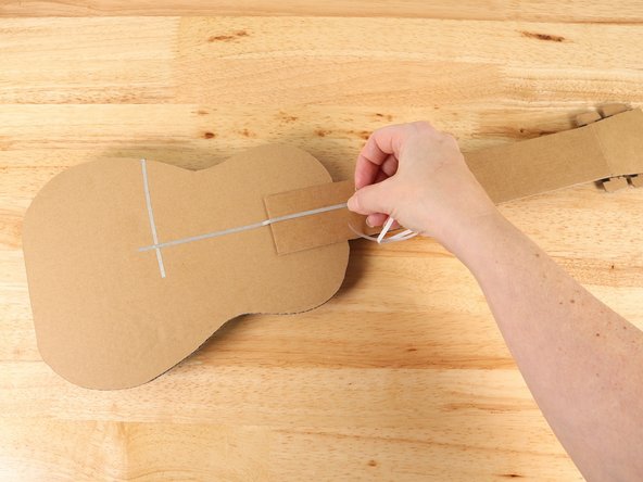 Add a long piece of Maker Tape that starts at the ground path and leads all the way up the neck.