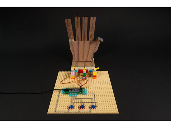 Congrats! You just built a cardboard hand and controlled it with a Robotics Board!