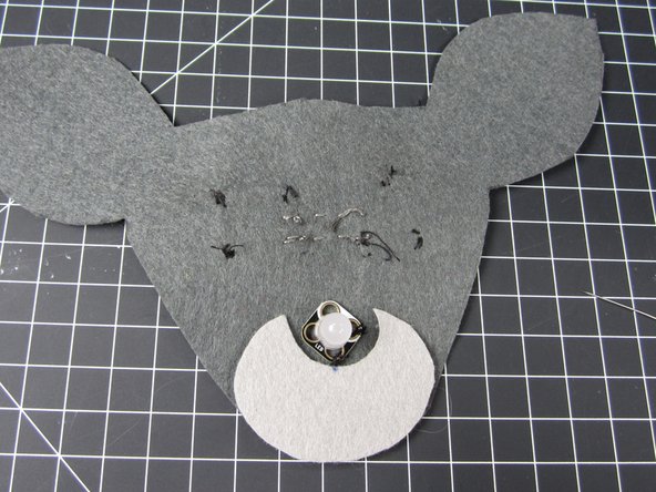 Connect one of the white holes from the LED with one of the white holes on the Blink/Fade Board.