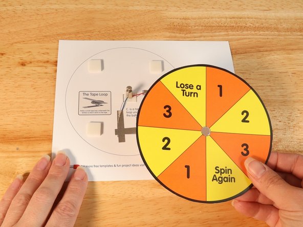 Place the spinner template of your choosing over the top of the motor so the motor goes through the small hole you cut earlier.