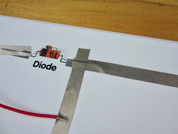 The long leg of your LED is positive, the short leg is negative. Typically LEDs also have a flat side along the base of the bulb above the negative leg.