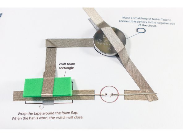 Fold the LED legs flat on top of the Maker Tape traces on the back.