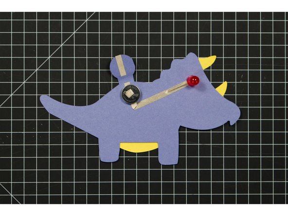 If you wanted to, you could use two tape loops (one for each side of the battery) and turn on and off your circuit without the need of a binder clip.