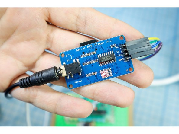 Connect the MP3 Player to the circuit: RX to Pin 13 and TX to Pin14.