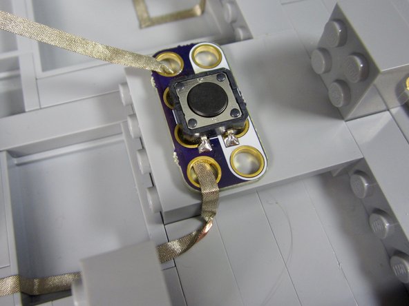 Connect the colored side of the B button to Pin 0.