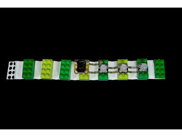 Take care to orient the white and black holes of each part exactly as pictured.