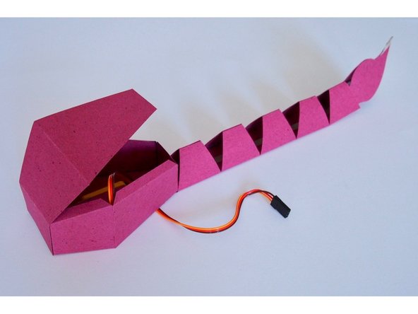 Glue the back on to ScorpioBot, sealing the body up.