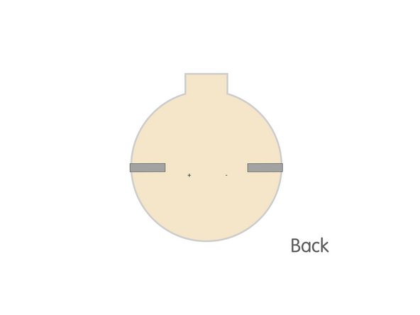 After you fold down the tape on the back of your ornament add another piece to extend the negative side to the center.