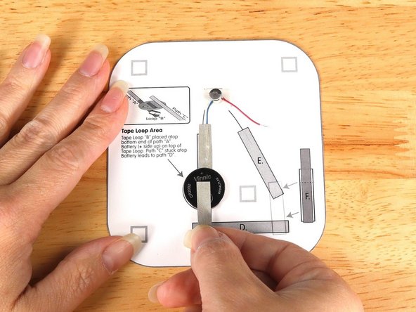 Add tape Path C. to the top of the battery and onto the template.