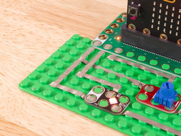 See the photos to show how this works. It's a technique we'll use for certain projects. It can also be used when you're tight on space for tape paths.