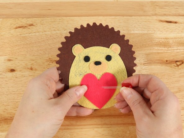 Add the LED by pushing the legs through the holes.