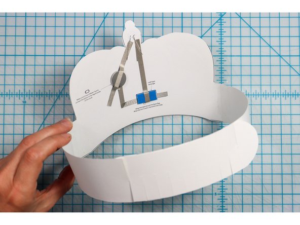 Interlock the slits in two places to create the size that works for your head. 