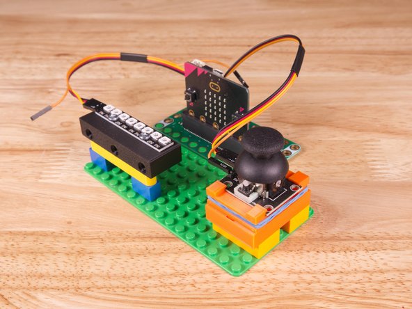 Alternately you can try to use some LEGO bricks and some rubber bands to hold the sensor in place, or just hold it in your hand.