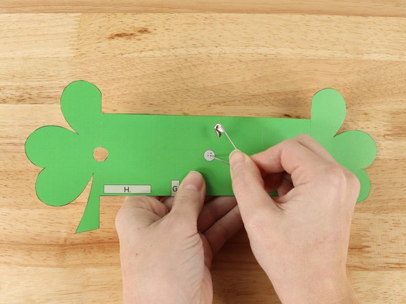 Use a safety pin or a thumbtack to poke holes for the LED legs to go through.