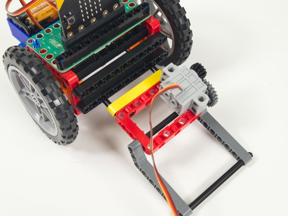 Center it and push it in so the pins lock it in place.