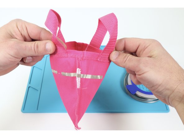 Follow the diagrams on the featured document or the photos at left to create Maker Tape paths where shown. Take note that there is an LED Side and a Battery Side of the bag.