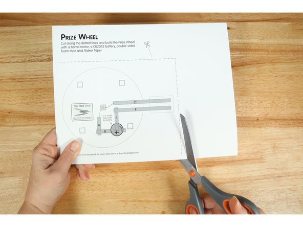 Cut  out all the parts on the first page and the small hole in the middle of the wheel template.