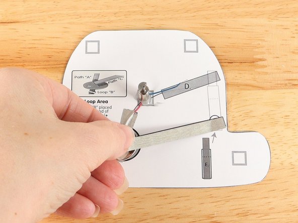 Add tape Path C. to the top of the battery and onto the template.