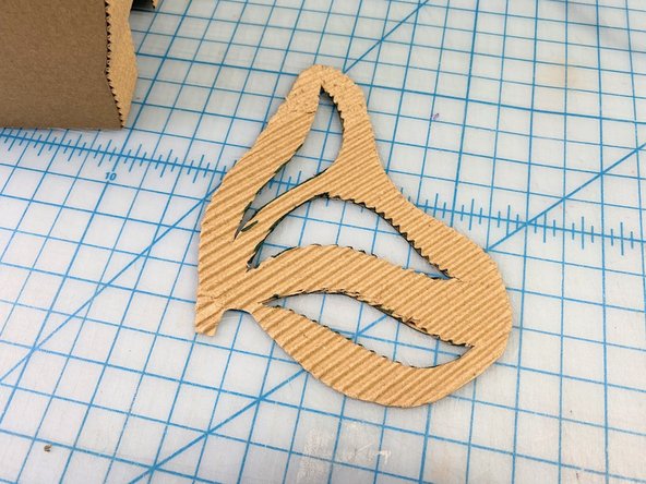 We drew one wing and made a template to cut two more.