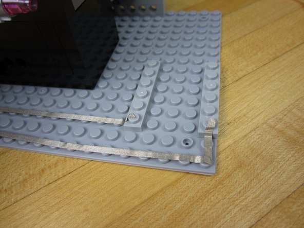 Connect your X-Wing back to the base.