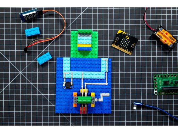 Note: If you are using a micro:bit V2 (or later) which has a built-in speaker you can skip this step.