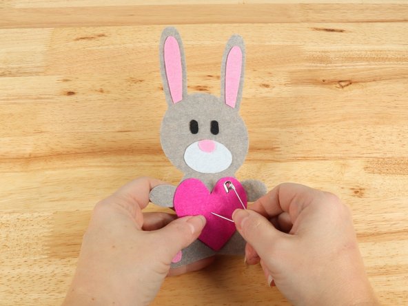 Use a safety pin or a push pin to poke two holes through the felt for the LED legs to go through.