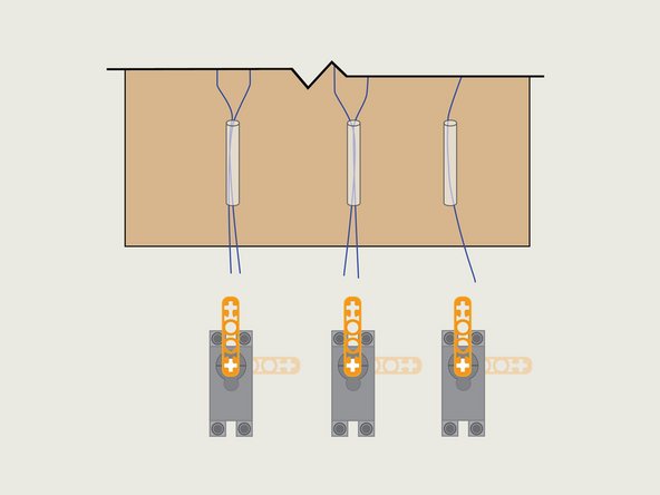We're going to use three 270 degree LEGO compatible servos with LEGO beams to pull the strings.