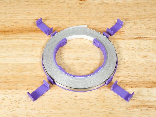 Once you have your roll of tape in place you can add the clips!