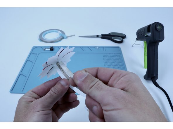 Use the remaining piece of Maker Tape to do the same to the longer LED atop the stem path on the opposite side.