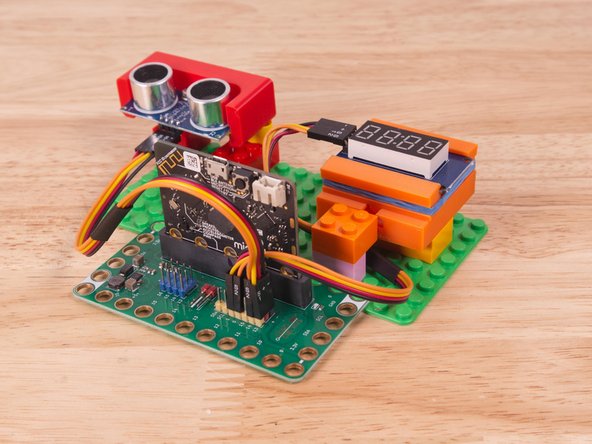 We can then plug the Orange wire labeled S2 into Pin 0 on the Bit Board.