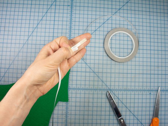 Peel the backing off the tape - only about an inch to start.