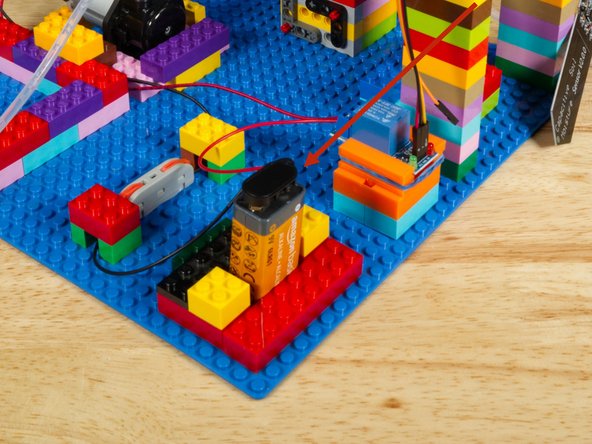 We built a little LEGO brick &quot;pocket&quot; to fit the battery into, but you can attach it in any way you like.