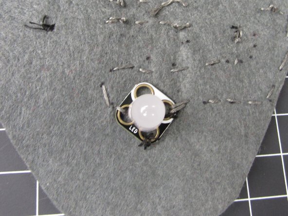 Connect a colored hole on the LED to either Pin 0 or Pin 1 on the Blink/ Fade Board.