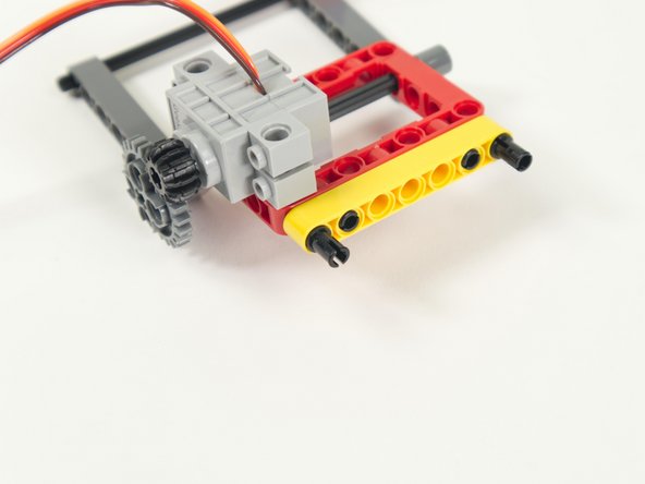 Connect the side that lines up with the holes in the frame.