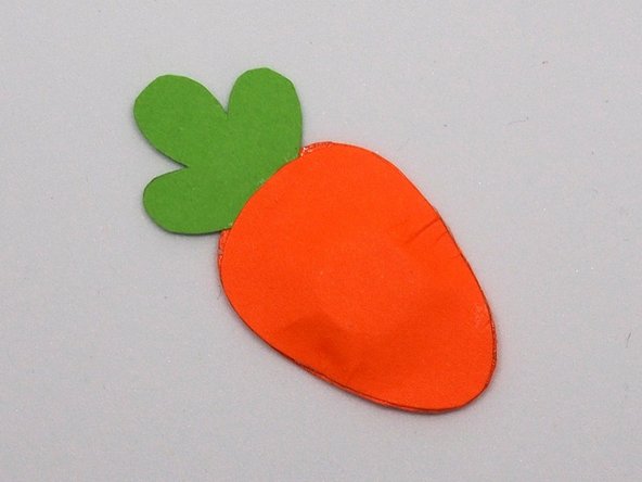 Attach the carrot stem then glue the pocket shut