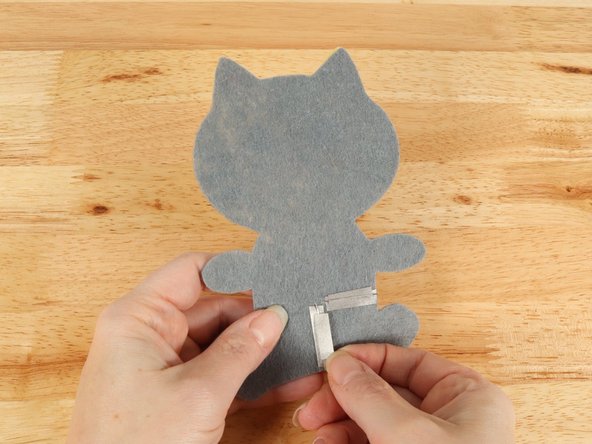 Place another piece of Maker Tape OVER THE TOP of the LED legs so the LED legs have Maker Tape under and on top of them.